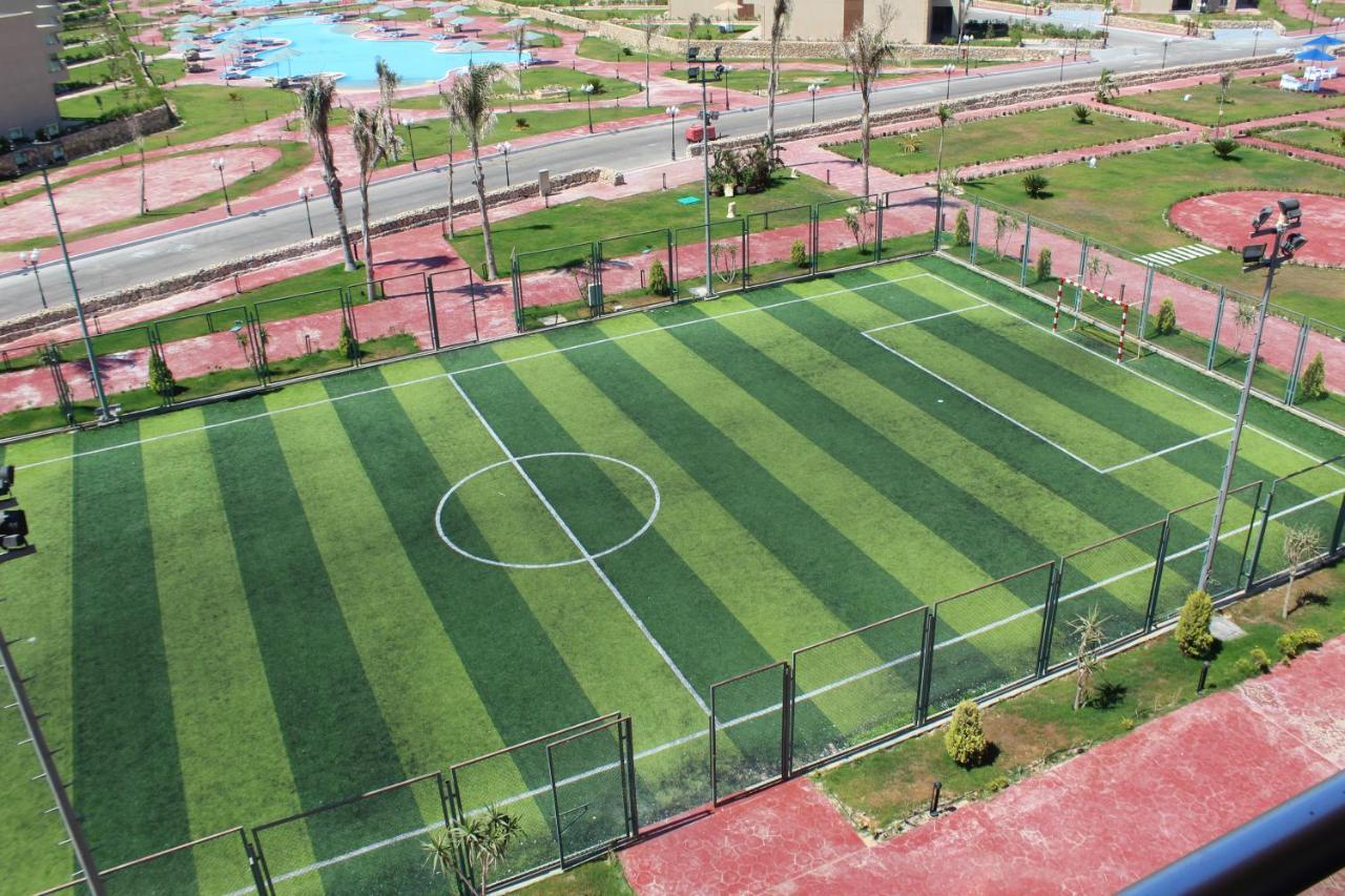 Tolip North Coast Hotel El Alamein Bagian luar foto The football field