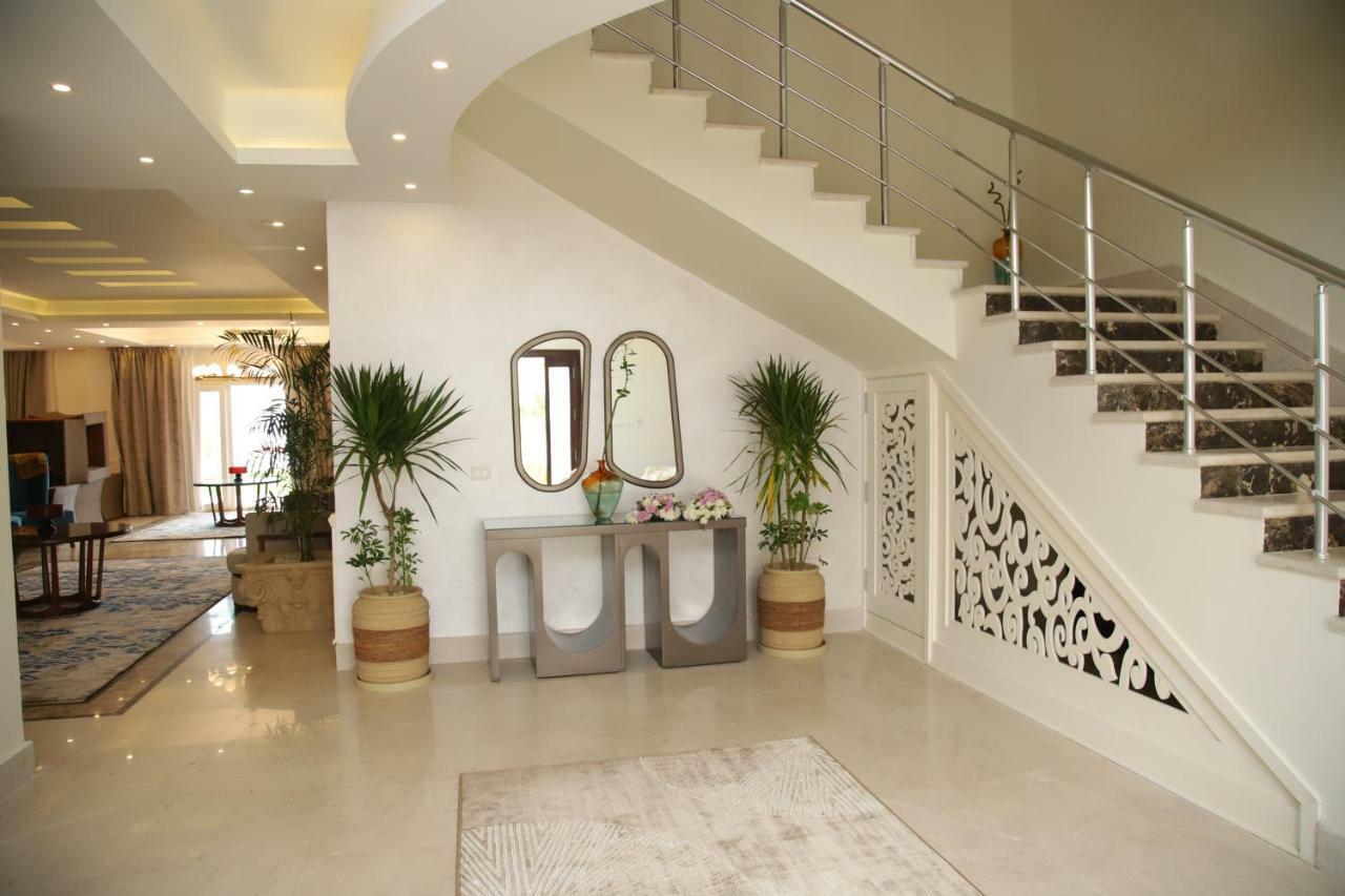 Tolip North Coast Hotel El Alamein Bagian luar foto A modern staircase